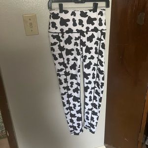 Feed Me Fight Me cow print leggings